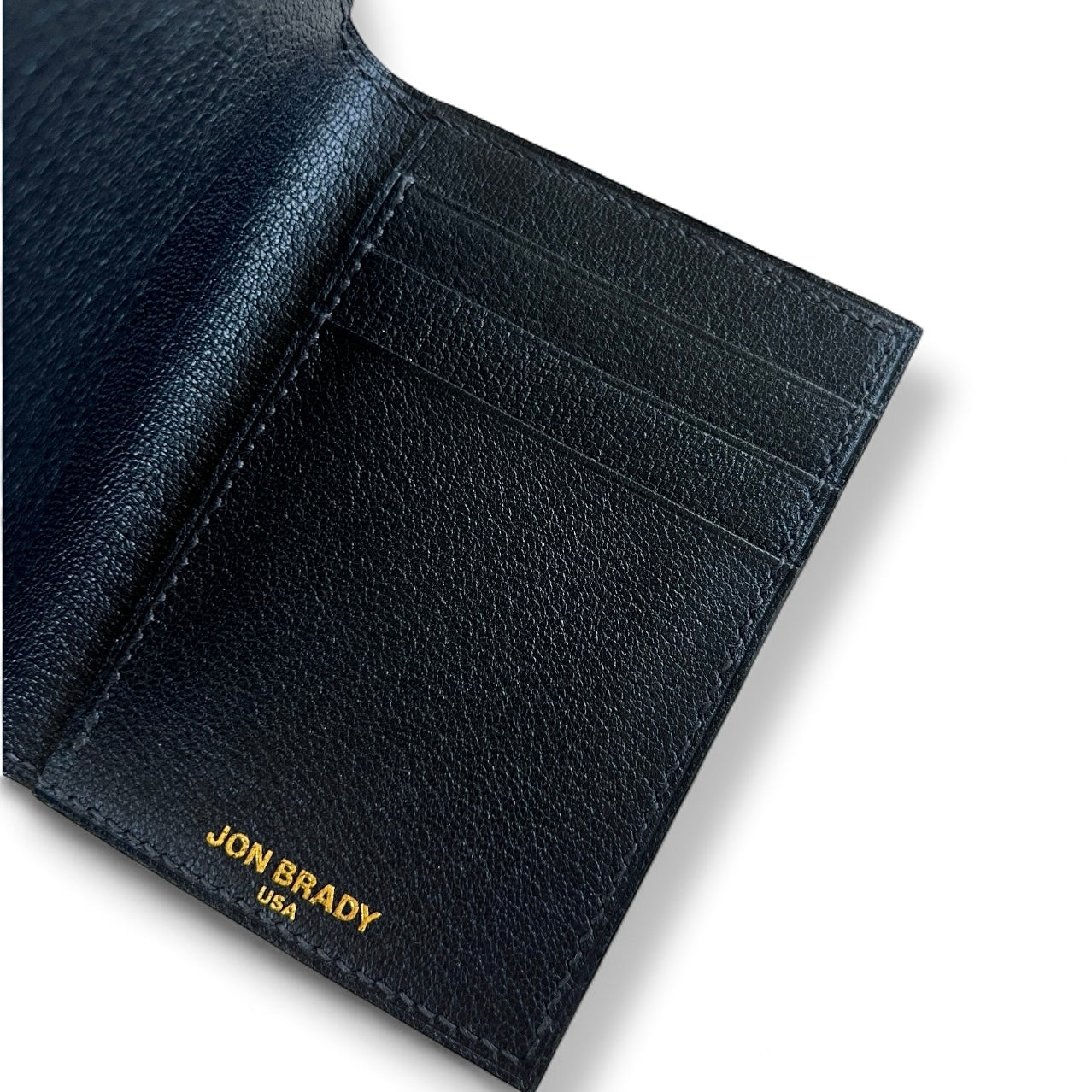 Camden wallet close up in alligator with chèvre interior, handcrafted by Jon Brady USA.