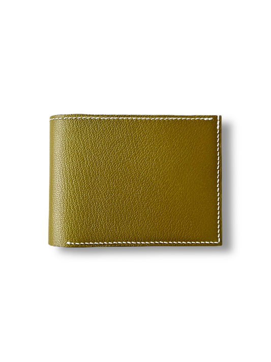 Ashford wallet in green leather and white hand stitching. 